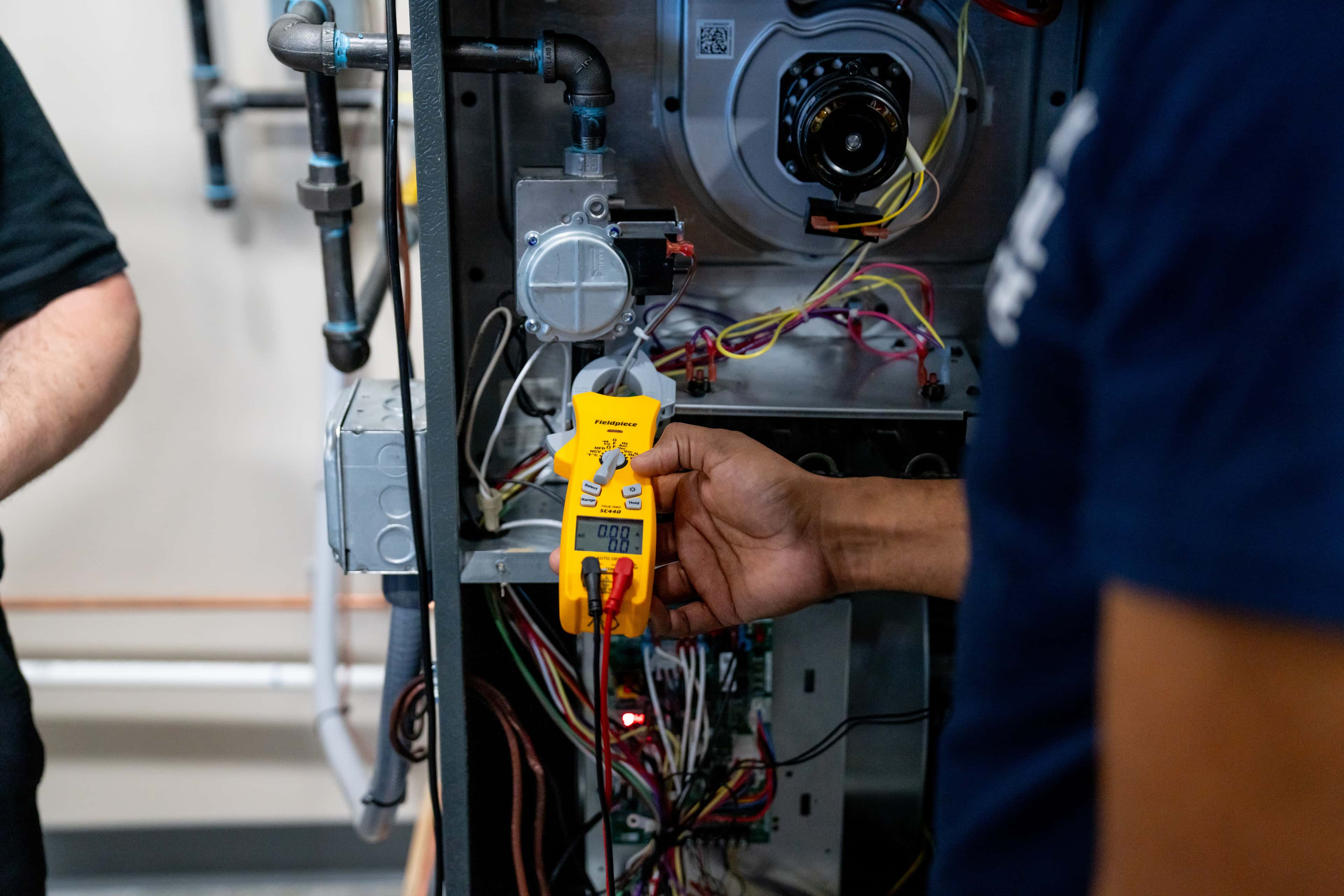 How To Use a Clamp Meter: Steps and Safety